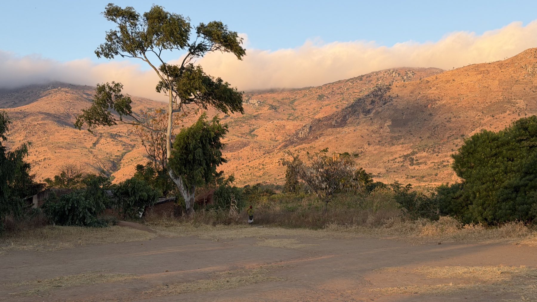 Morning light on the hills above a Malawian village