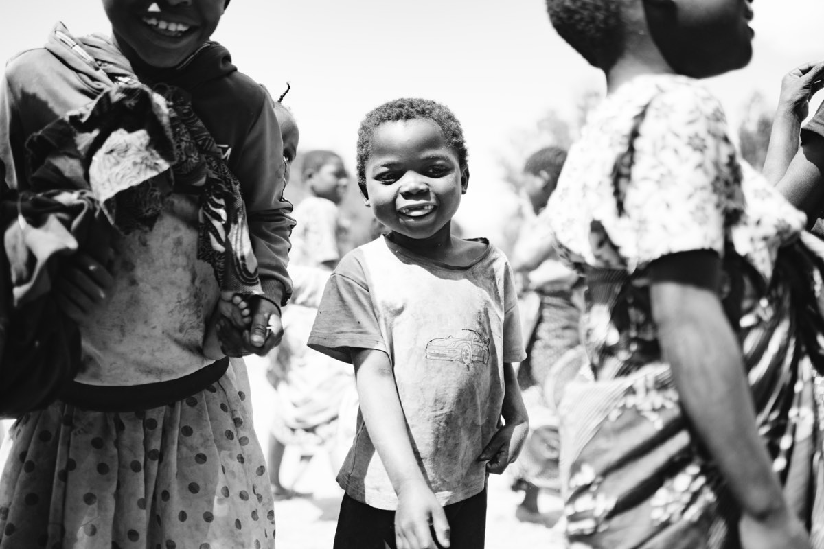 A young child looking at the camera